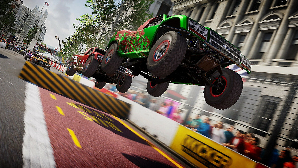 Gra EA GRID Legends PS4 PL dwa samochody w locie po skoku z rampy